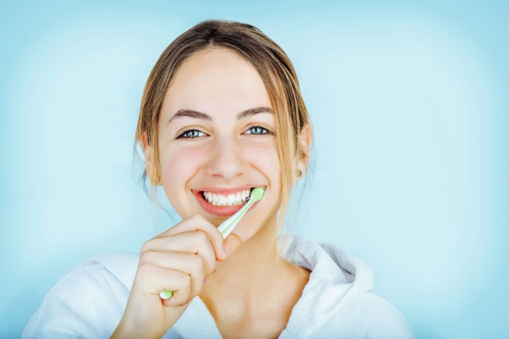 Woman Brushing Teeth